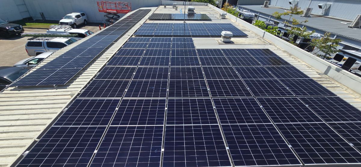 Commercial rooftop solar panel installation for a business in Brisbane