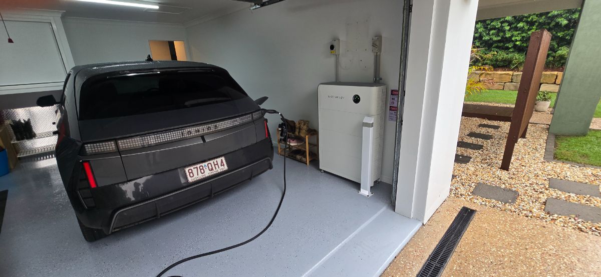 Residential EV charger installed in a home garage by Connect Energy in Brisbane